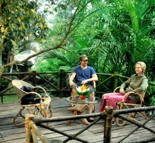 Guests relaxing in sit-out at the Bamboo Tree House Guests relaxing in sit-out at the Bamboo Tree House