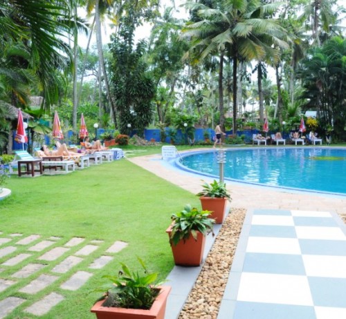 Guests relaxing by the pool Guests relaxing by the pool