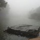 Lake amidst mist