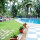 Guests relaxing by the pool Guests relaxing by the pool