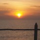 Setting sun by the sea Setting sun by the sea